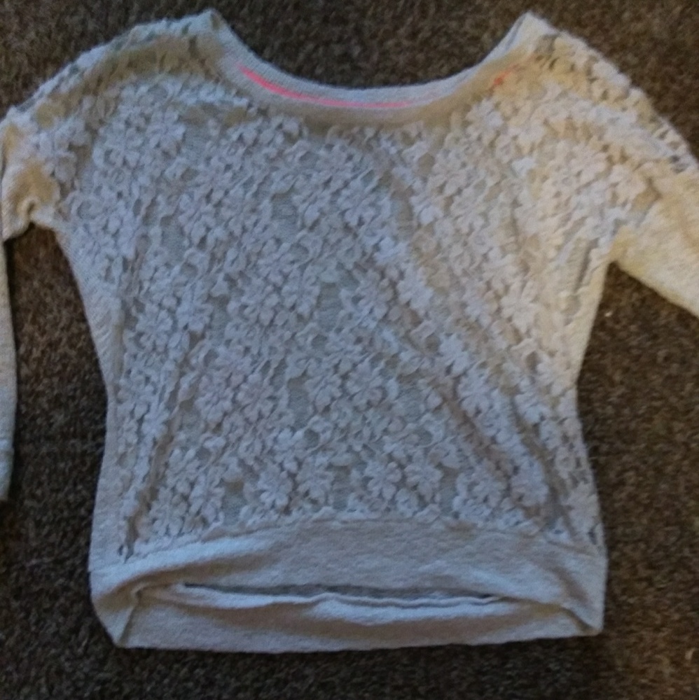 I'm selling a white/tan colored shirt
